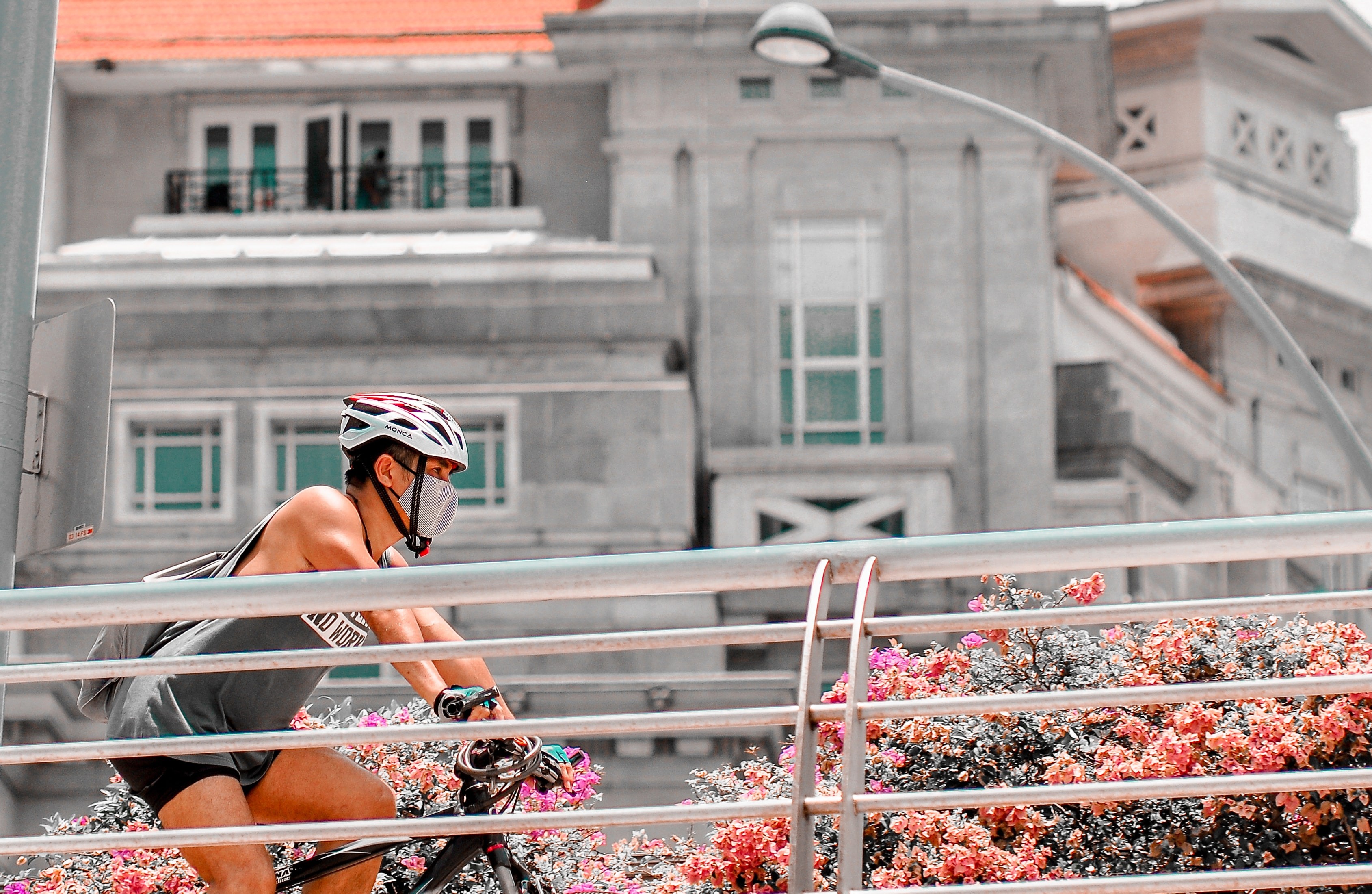 Woman with Face Mask on Bike